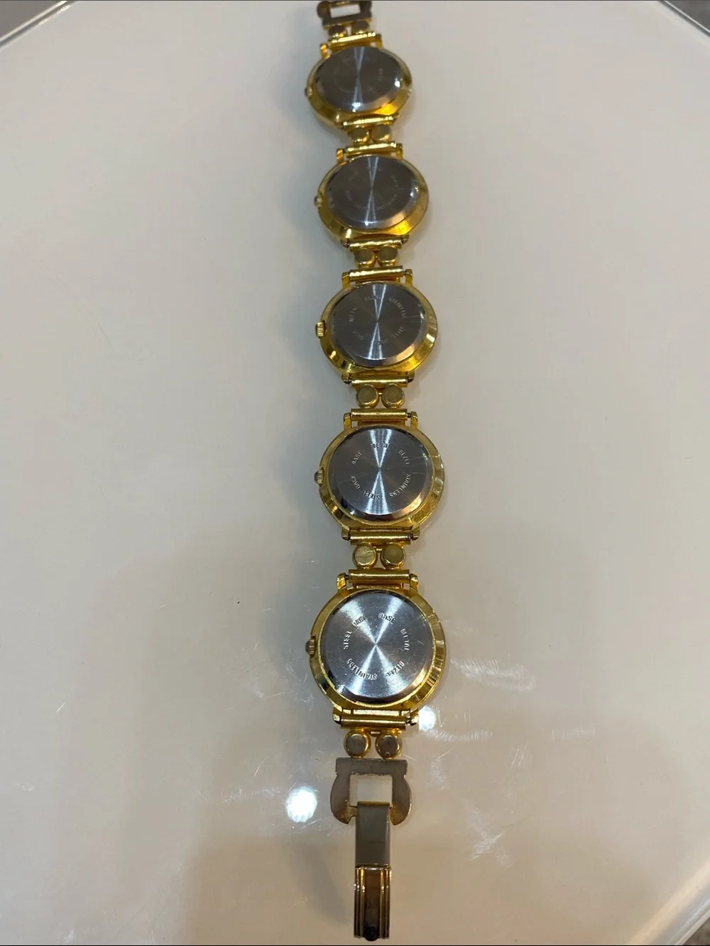Faux pearl gold tone watch
